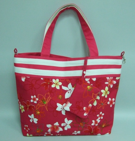 桐花束口手提包