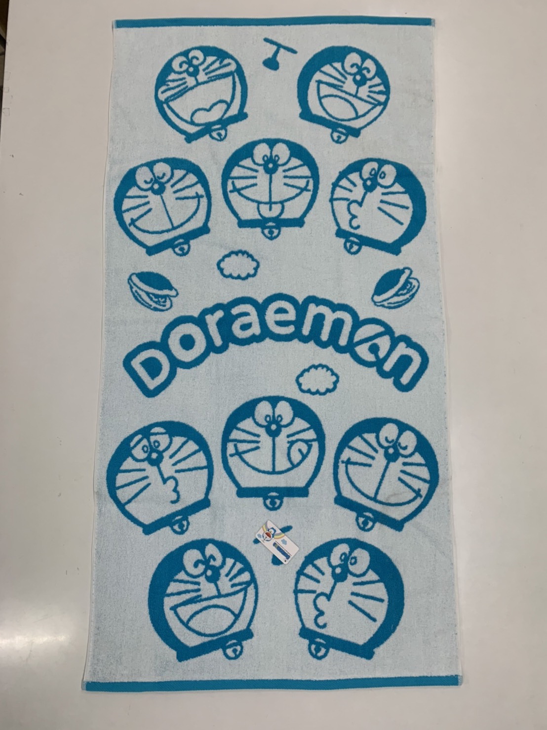 DA402-1Doraemon 色紗緹花浴巾-百變表情
